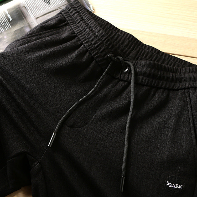 Withdraw cabinet high elastic sports pants men's wholesale winter thick black casual leggings men's long pants D1954