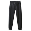 Withdraw cabinet high elastic sports pants men's wholesale winter thick black casual leggings men's long pants D1954