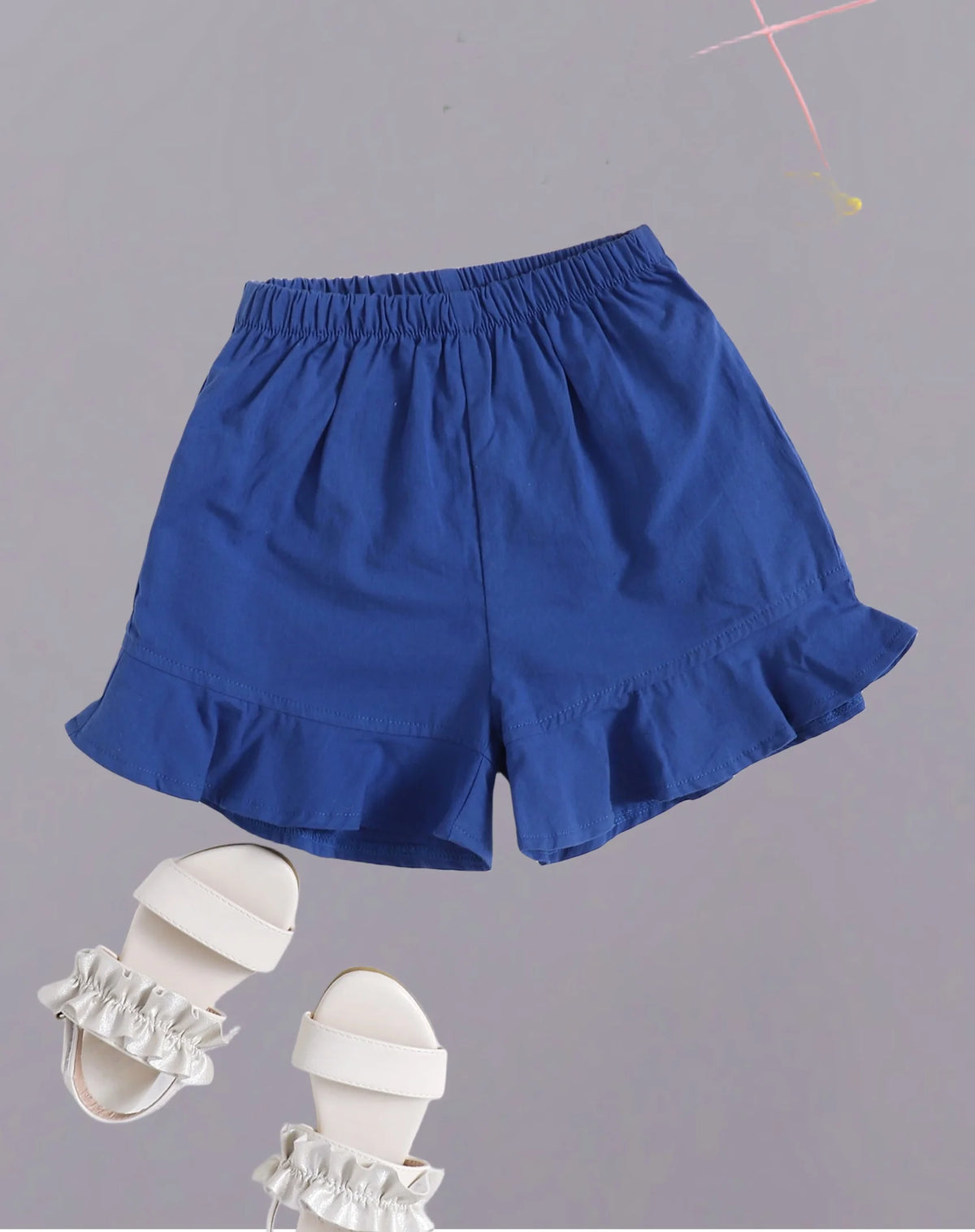Girls' dark blue ruffled shorts - comfortable elastic waist design